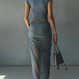 Alicia | Tweedelige blauwe set met cropped top en gedrapeerde maxi-rok