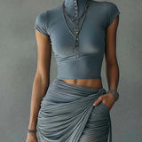 Alicia | Tweedelige blauwe set met cropped top en gedrapeerde maxi-rok