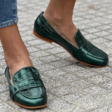 Loafers met krokodillenstructuur en elegant silhouet