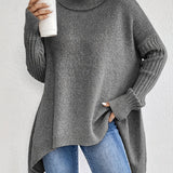Oversized coltrui met zachte knit en verlengde achterkant