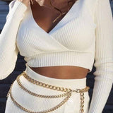 Eulalie | Tweedelige gebreide set met wrap crop top en midi-rok met knopendetail