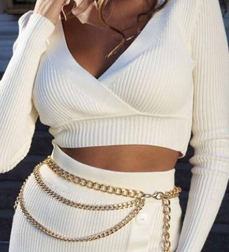 Eulalie | Tweedelige gebreide set met wrap crop top en midi-rok met knopendetail