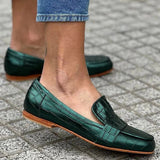 Loafers met krokodillenstructuur en elegant silhouet