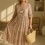 Midi jurk met stippenprint en gelaagde rok