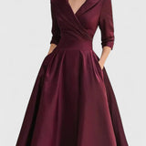 Satijnen jurk met vintage charme en flatterende snit