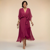 Mila | Elegante chiffon midi jurk met strikceintuur