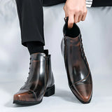 Leren laarzen met broguedetails en gepolijste afwerking