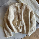 Tilda | Cardigan met lange mouwen en zachte abrikoos tint