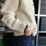 Tilda | Cardigan met lange mouwen en zachte abrikoos tint