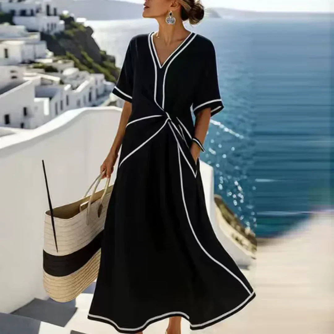 Jurk met flatterende taille en elegante V-hals