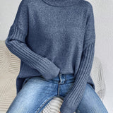 Oversized coltrui met zachte knit en verlengde achterkant