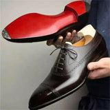 Leren Oxford schoenen met brogue details en rode leren zool
