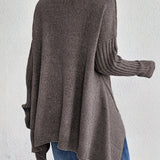Oversized coltrui met zachte knit en verlengde achterkant