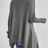 Oversized coltrui met zachte knit en verlengde achterkant