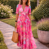 Ione | Mouwloze midi-jurk met bloemen en V-hals