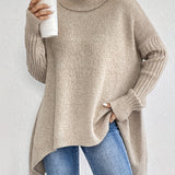 Oversized coltrui met zachte knit en verlengde achterkant