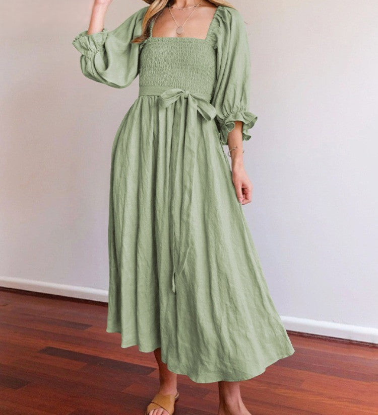 Noëlle | Jurk met volant mouwen en elegante French-style pasvorm