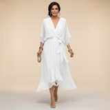 Mila | Elegante chiffon midi jurk met strikceintuur