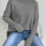 Oversized coltrui met zachte knit en verlengde achterkant