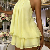Elise | Elegante halterjurk met zwierige lagen