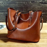 Cali | Schoudertas met vintage leren look en ruime opbergruimte