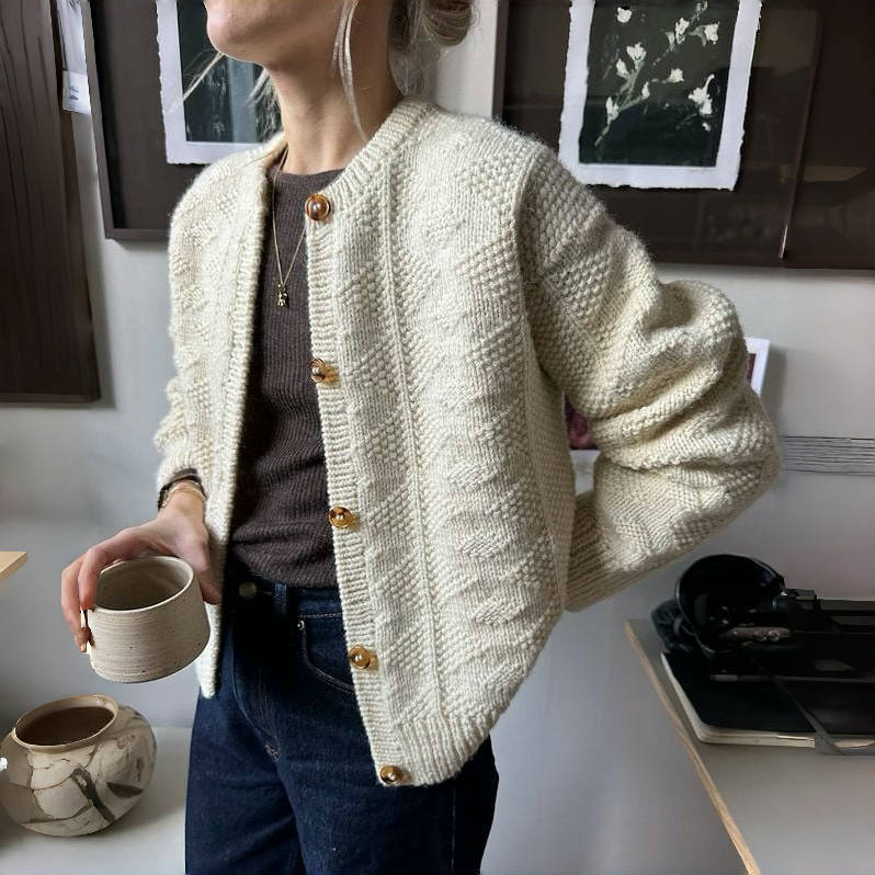 Tilda | Cardigan met lange mouwen en zachte abrikoos tint