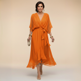 Mila | Elegante chiffon midi jurk met strikceintuur