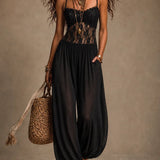 Eulalie | Zwarte bohemian jumpsuit met kant en wijde pijpen