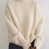 Coltrui in zachte knit met hoge kraag en tijdloze uitstraling