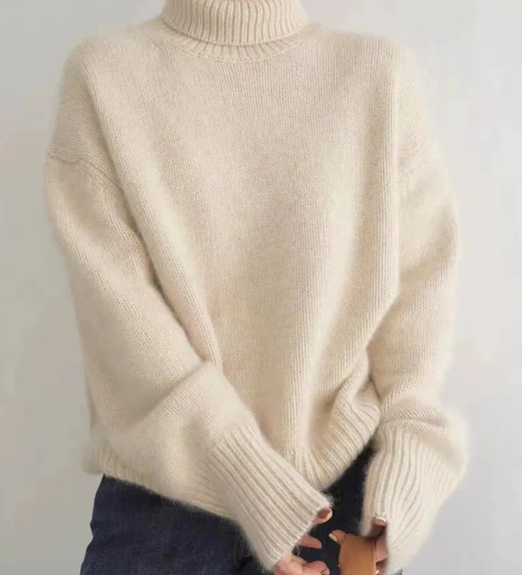 Coltrui in zachte knit met hoge kraag en tijdloze uitstraling