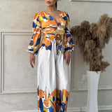 Maxi Jurk met Statement Print en Getailleerde Taille