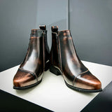 Leren laarzen met broguedetails en gepolijste afwerking