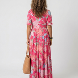 Ione | Mouwloze midi-jurk met bloemen en V-hals