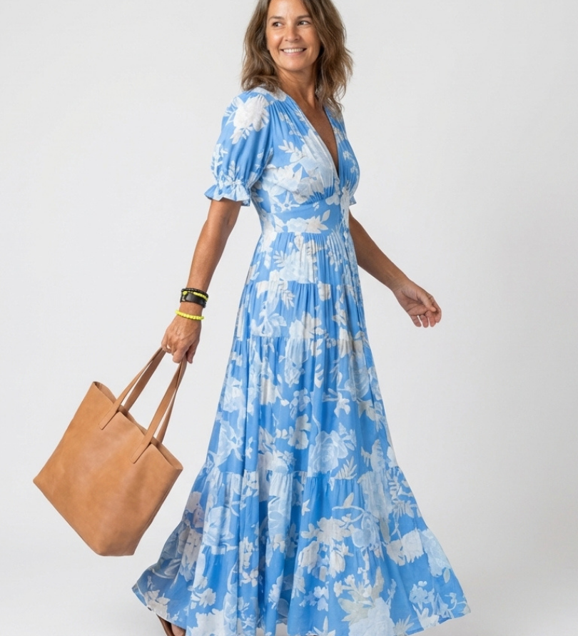 Ione | Mouwloze midi-jurk met bloemen en V-hals