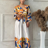 Maxi Jurk met Statement Print en Getailleerde Taille