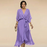Mila | Elegante chiffon midi jurk met strikceintuur