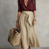Vida Conjunto Elegante de Dos Piezas con Blusa Negra y Falda Midi