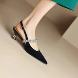 Slingback pumps met kristallen band en puntige neus