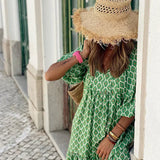 Maxi jurk met V-hals en bohemian print voor zomerse elegantie
