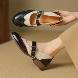 Leren Mary Janes met brogue-details en T-band sluiting
