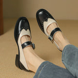 Leren Mary Janes met brogue-details en T-band sluiting