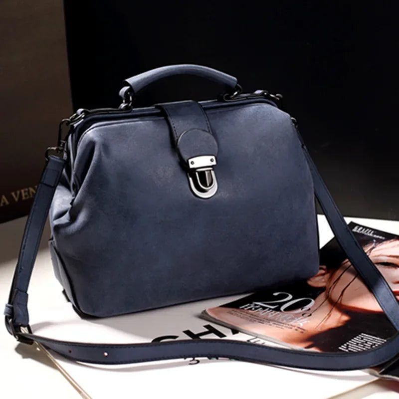 Pip | Vintage Handtas met Metalen Sluiting en Ruim Interieur