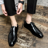 Klassieke herenschoenen met monk strap en geperforeerde details