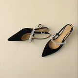 Slingback pumps met kristallen band en puntige neus