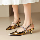 Slingback pumps met kristallen band en puntige neus