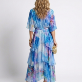 Calista | Maxi jurk van transparant materiaal met V-hals en gestrikte taille