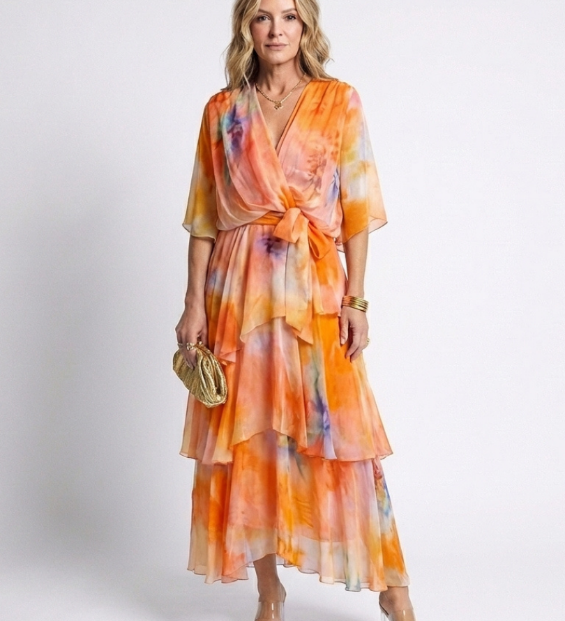 Calista | Maxi jurk van transparant materiaal met V-hals en gestrikte taille