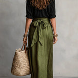 Vida Conjunto Elegante de Dos Piezas con Blusa Negra y Falda Midi
