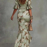 Valentina | Groene asymmetrische maxi-jurk met bloemenprint en ruches