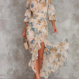 Aitana | Beige chiffon maxi-jurk met bloemenprint en asymmetrische ruches